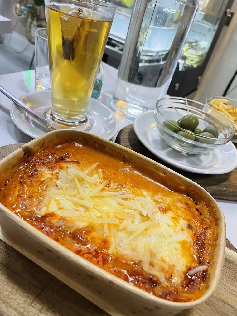 Baked pasta topped with melted cheese