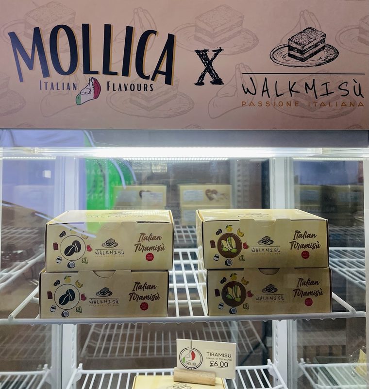 Boxed Italian gelato in the freezer cabinet, cropped to the tubs so no banner lettering is in frame